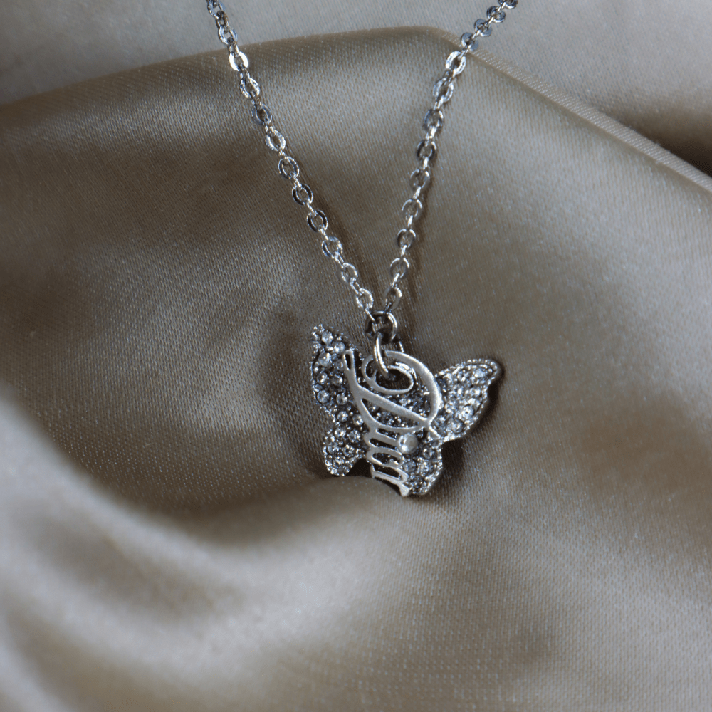 CHRISTIAN DIOR Butterfly Rhinestone Pendant Bracelet | VINTASY