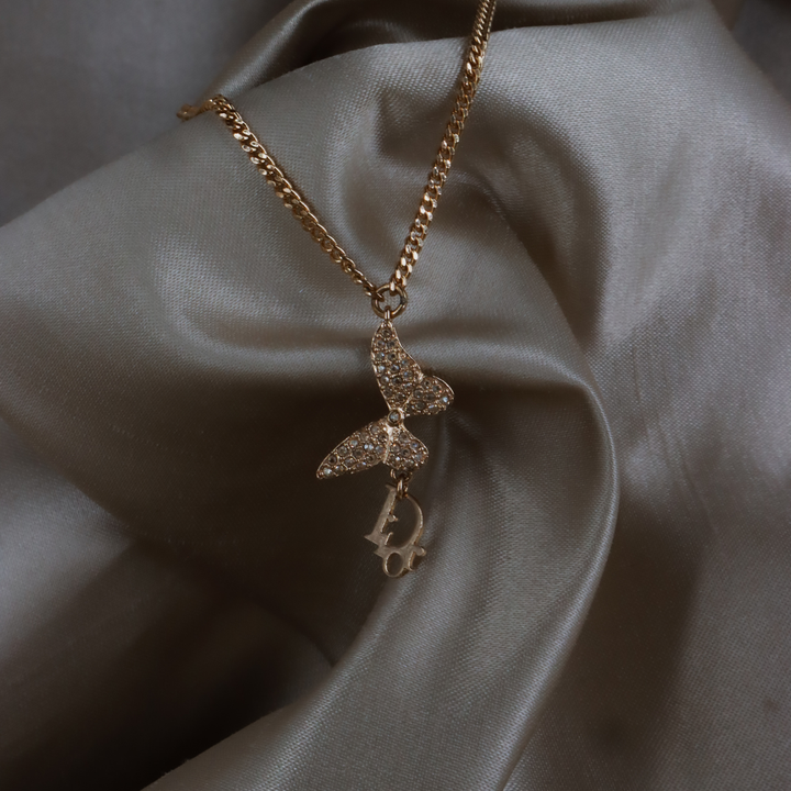 CHRISTIAN DIOR 玫瑰金蝴蝶結 CD Logo 水晶手鏈