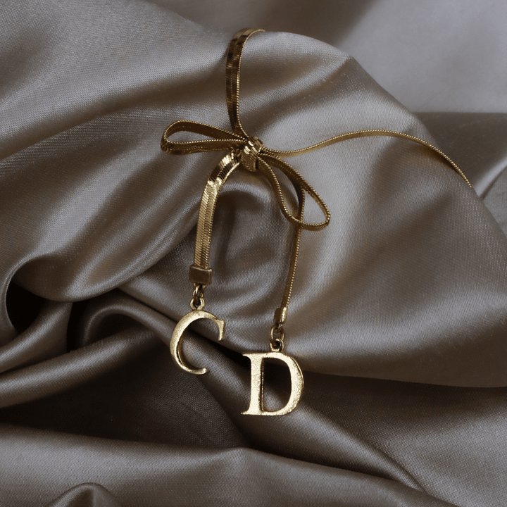 CHRISTIAN DIOR 金色緞帶手鏈 ｜ 2000年代初 - Vintasy