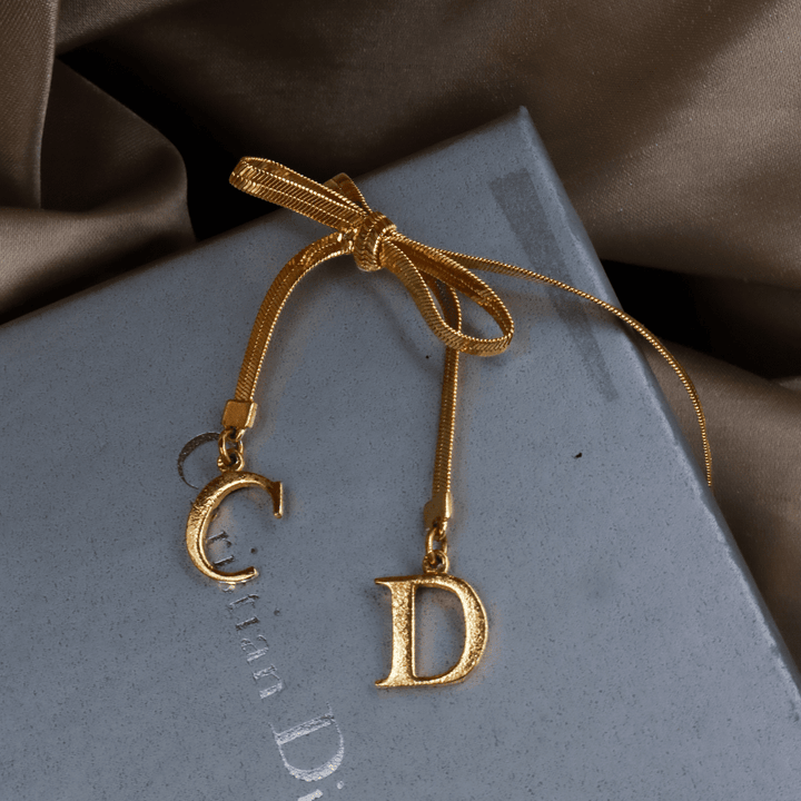 CHRISTIAN DIOR 金色緞帶手鏈 ｜ 2000年代初 - Vintasy