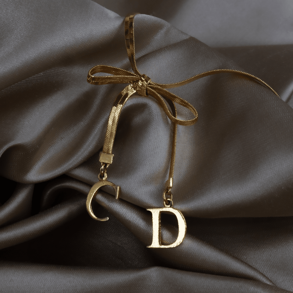 CHRISTIAN DIOR 金色緞帶手鏈 ｜ 2000年代初 - Vintasy