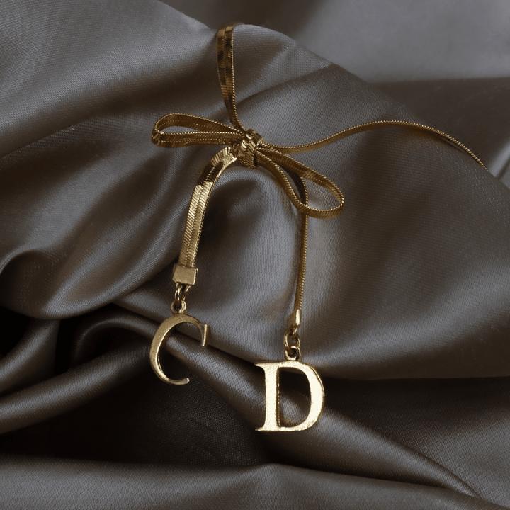 CHRISTIAN DIOR 金色緞帶手鏈 ｜ 2000年代初 - Vintasy