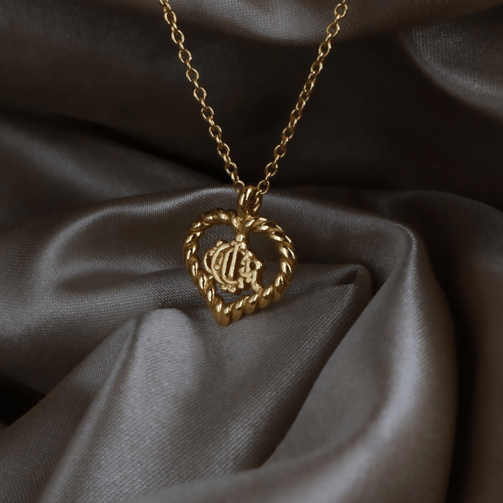 CHRISTIAN DIOR 金色愛心馬車 CD Logo 項鏈（Heart Logo Pendant款）｜1990年代經典 - Vintasy項鏈