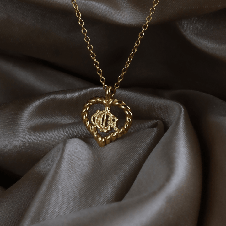 CHRISTIAN DIOR 金色愛心馬車 CD Logo 項鏈（Heart Logo Pendant款）｜1990年代經典 - Vintasy項鏈