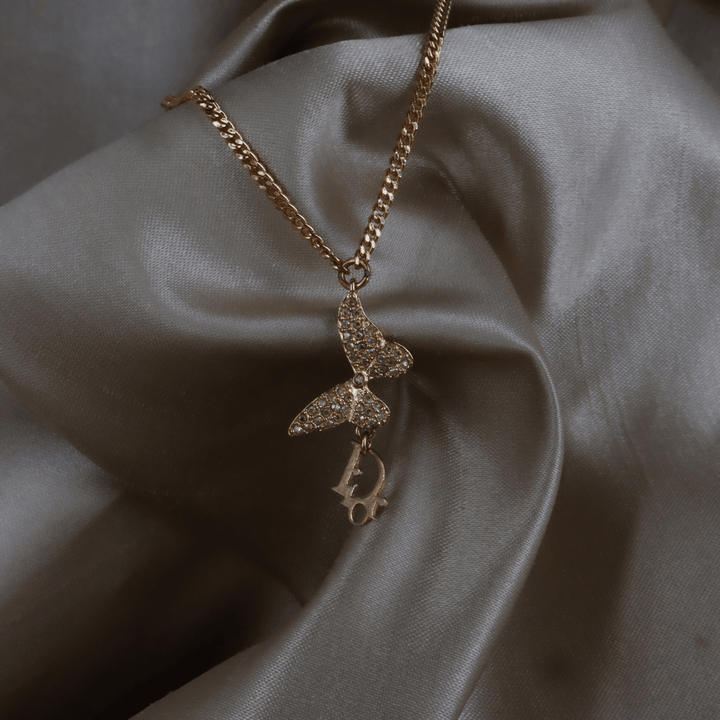 CHRISTIAN DIOR 玫瑰金蝴蝶結 CD Logo 水晶手鏈 - Vintasy項鏈