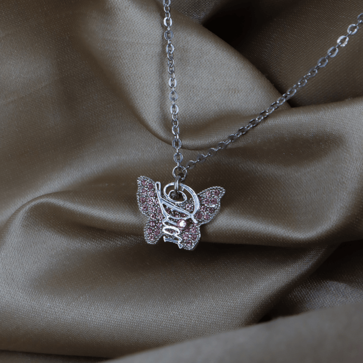 CHRISTIAN DIOR 銀色粉紅水晶蝴蝶Logo吊墜項鏈｜未使用美品 ｜2000年代 - Vintasy