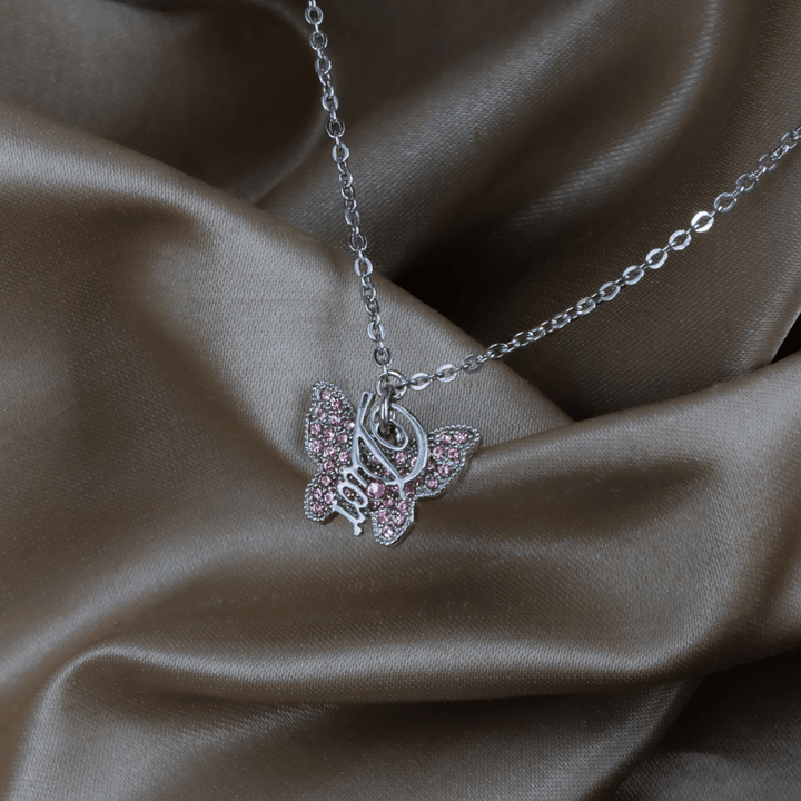 CHRISTIAN DIOR 銀色粉紅水晶蝴蝶Logo吊墜項鏈｜未使用美品 ｜2000年代 - Vintasy