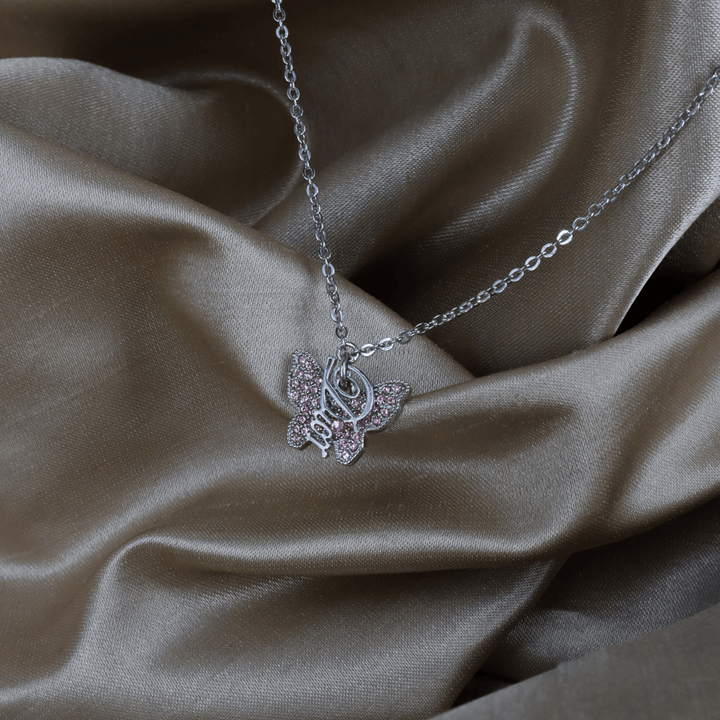 CHRISTIAN DIOR 銀色粉紅水晶蝴蝶Logo吊墜項鏈｜未使用美品 ｜2000年代 - Vintasy