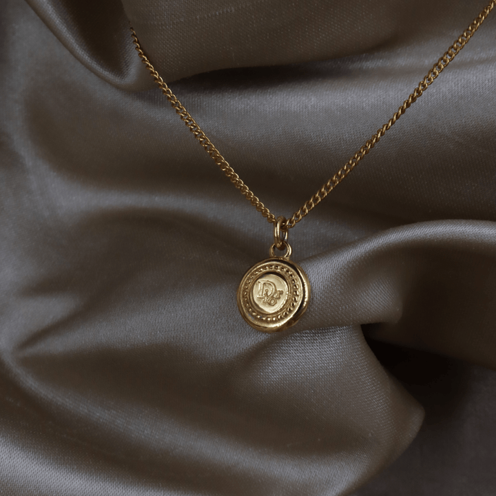 CHRISTIAN DIOR 金色圓牌logo項鏈｜1990年代 - Vintasy