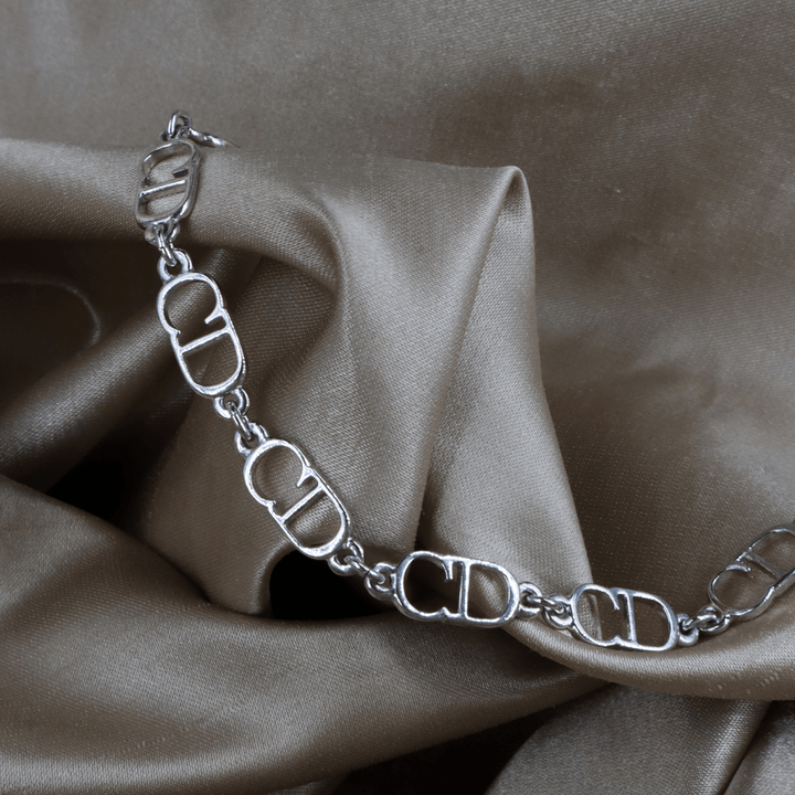 CHRISTIAN DIOR 銀色鏤空字母鏈環手鏈 ｜未使用品連原盒 - Vintasy手鏈
