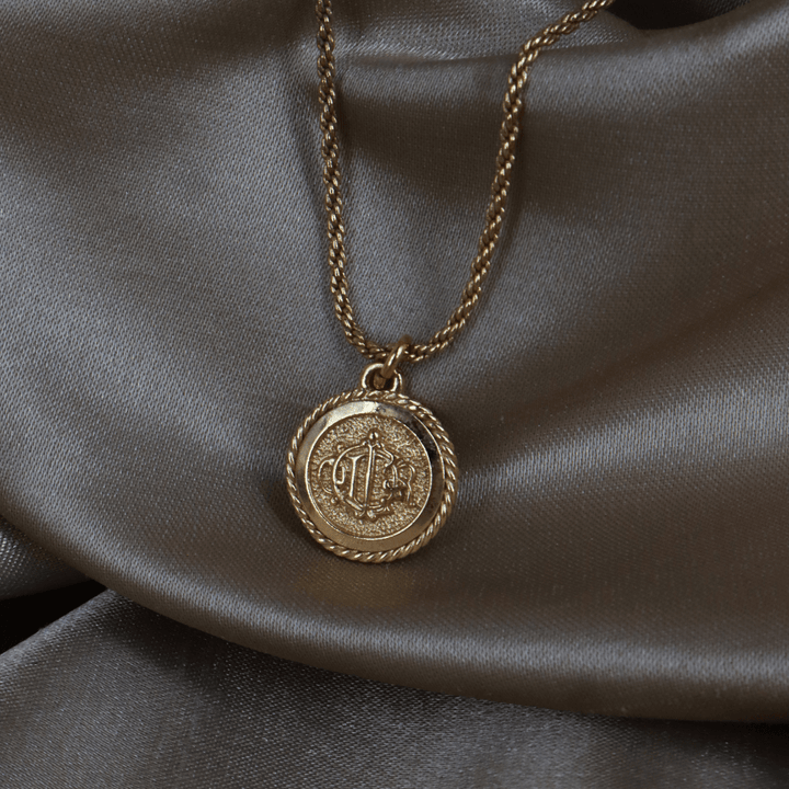 CHRISTIAN DIOR 圓形馬車標誌繩紋邊項鏈 - Vintasy