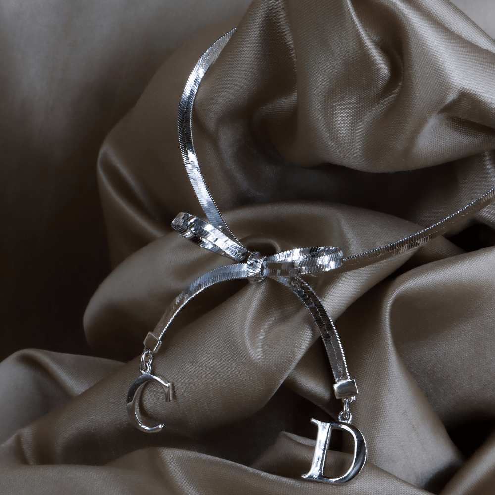 CHRISTIAN DIOR 蝴蝶結吊墜手鏈 - Vintasy項鏈