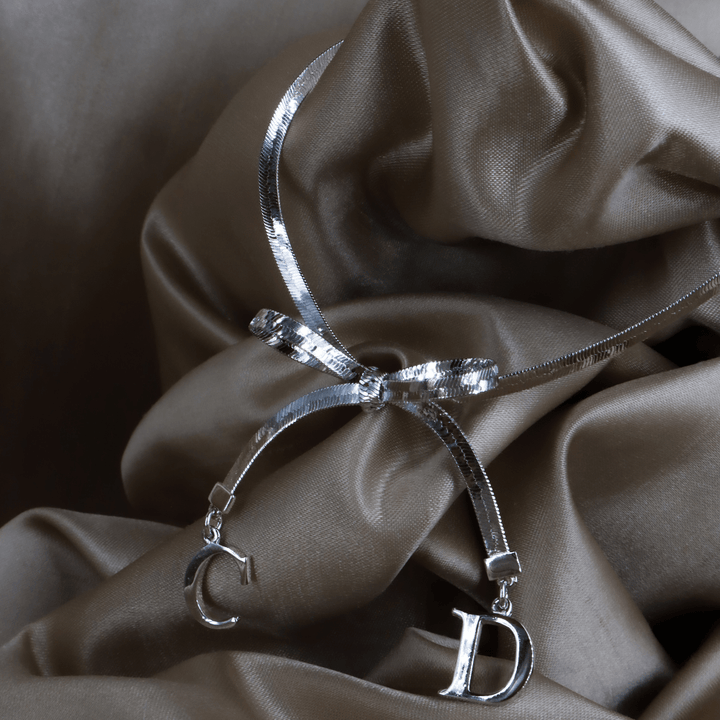 CHRISTIAN DIOR 蝴蝶結吊墜手鏈 - Vintasy項鏈