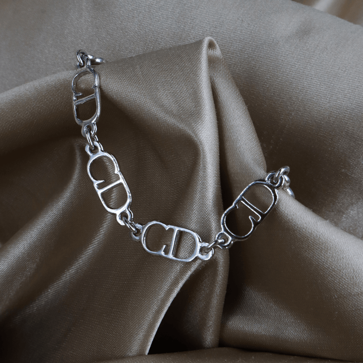 CHRISTIAN DIOR 銀色鏤空字母鏈環手鏈 ｜未使用品連原盒 - Vintasy手鏈