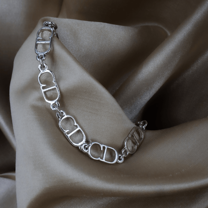 CHRISTIAN DIOR 銀色鏤空字母鏈環手鏈 ｜未使用品連原盒 - Vintasy手鏈
