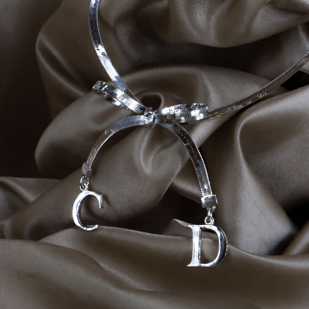 CHRISTIAN DIOR 蝴蝶結吊墜手鏈 - Vintasy項鏈