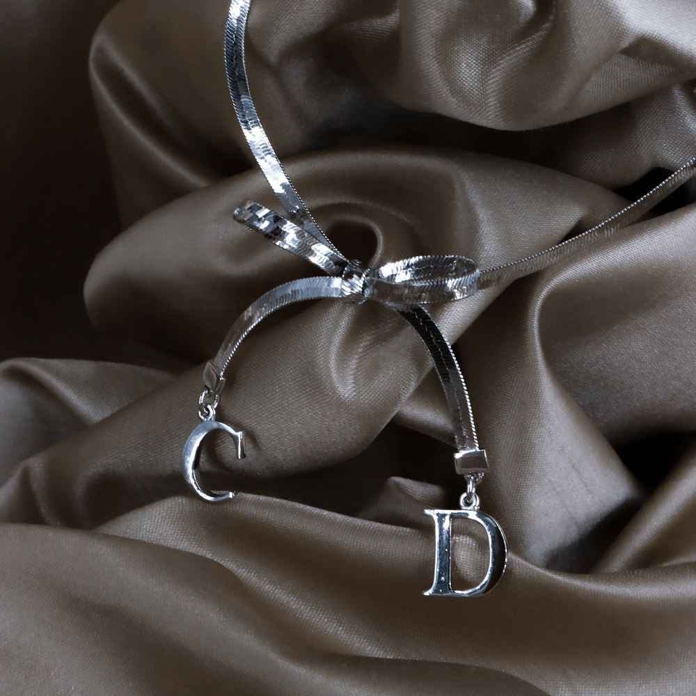 CHRISTIAN DIOR 蝴蝶結吊墜手鏈 - Vintasy項鏈