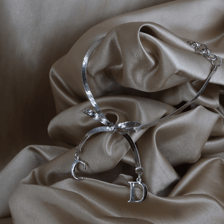 CHRISTIAN DIOR 蝴蝶結吊墜手鏈 - Vintasy項鏈